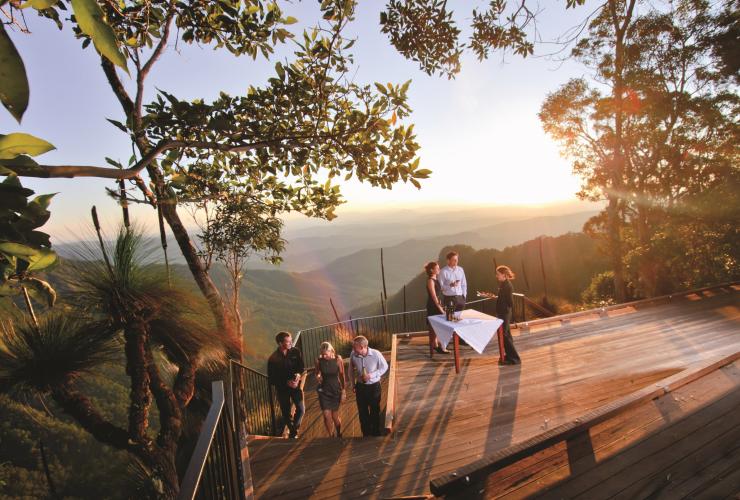 Event groups enjoy sunset drinks overlooking the rainforested hills at O'Reilly's Rainforest Retreat, Queensland © O'Reilly's Rainforest Retreat