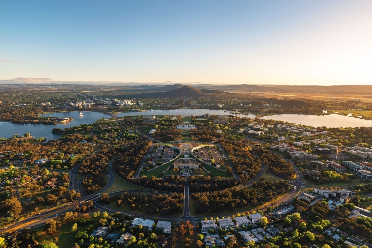 Aerial view over parliament house and Lake Burley Griffin in Canberra, Australian Capital Territory © VisitCanberra