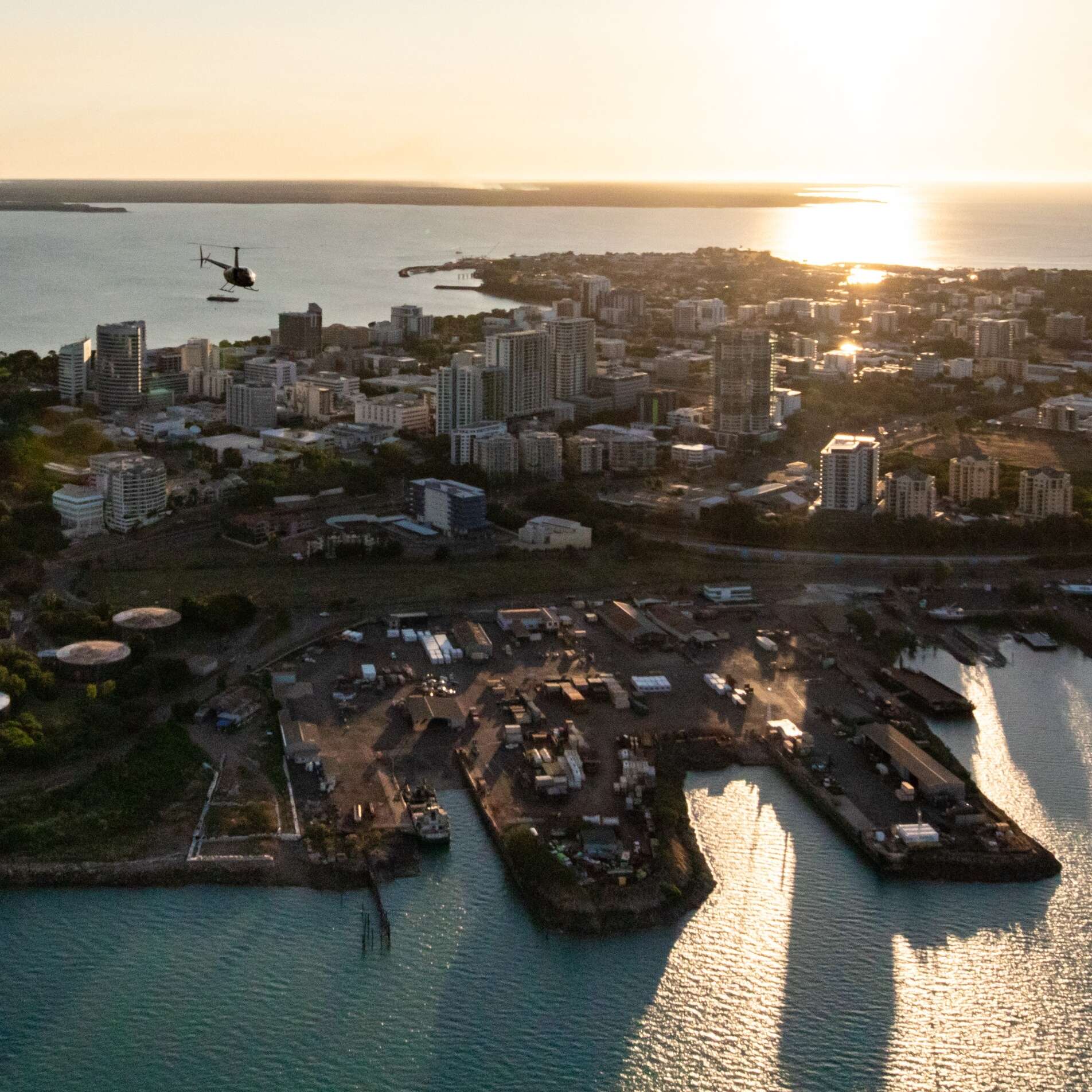 Aerial of Darwin city at sunset with Helicopter, Darwin, NT © Liam Neal