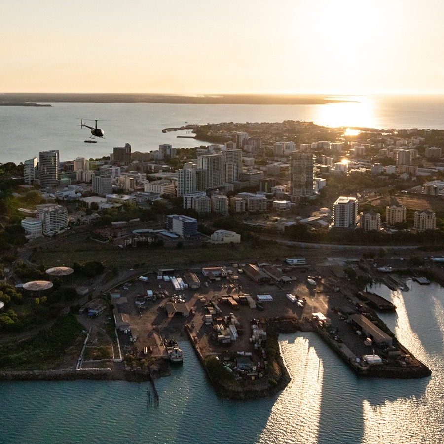 Aerial of Darwin city at sunset with Helicopter, Darwin, NT © Liam Neal