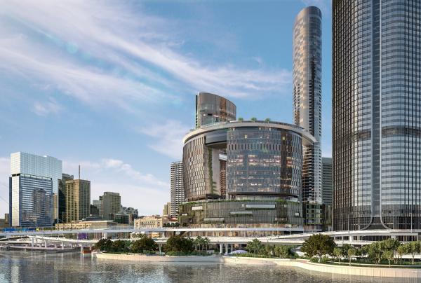 Futuristic curved skydeck and glass skyscrapers set along a waterfront precinct, captured by Tourism Australia at Queen's Wharf, Brisbane, Queensland. © Tourism Australia