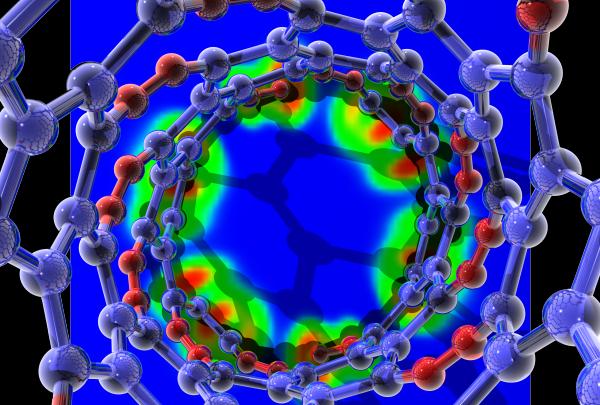A 3D molecular visualisation looking down the center of a blue and red tubular lattice structure with a glowing thermal inner core highlights. © Dr Amanda Barnard