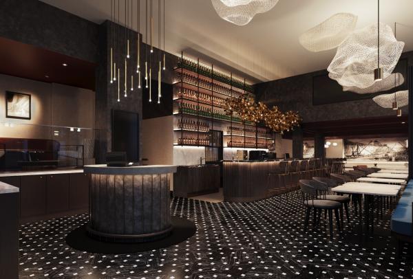 A stylish hotel lobby bar features geometric tiled flooring, warm pendant lighting, and a dark marble service counter, Aiden Hotel, Darling Harbour, Sydney, New South Wales. © Aiden Hotels
