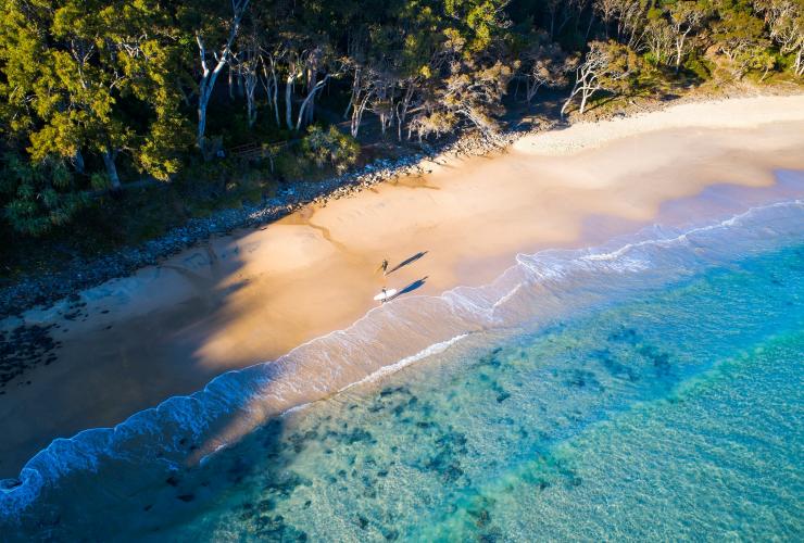 Surfers at Tea Tree Bay, Noosa National Park, Queensland © Tourism and Events Queensland