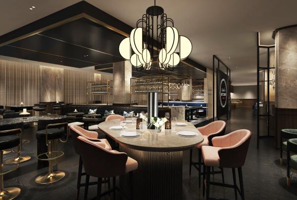 An elegant dining room featuring blush-pink velvet armchairs around a marble table beneath a dramatic sculptural chandelier, Kimpton Margot Hotel, Sydney, New South Wales. © Kimpton Margot