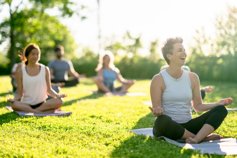 A group sitting in Kings Park, Perth on mats enjoying a mindful experience, Western Australia © Mindful in Nature