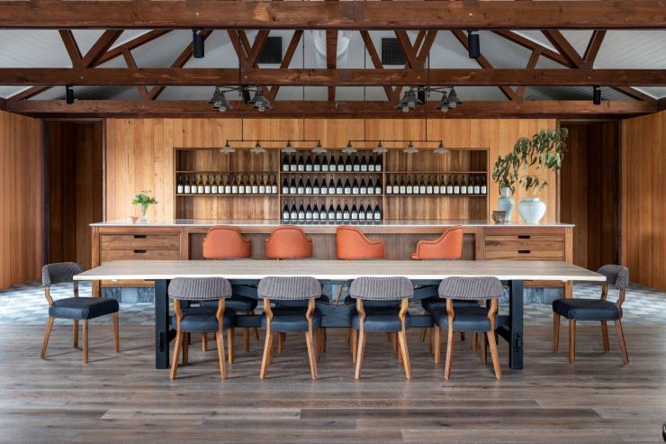 The Barn at Mount Pleasant with a long table and bar © Mount Pleasant