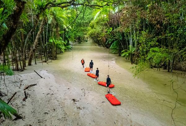 Guests enjoying the River Drift Experience peacefully floating down the Mossman River, Daintree, Queensland © Back Country Bliss