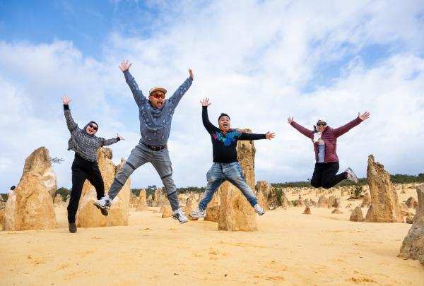 Delegates jump for joy at The Pinnacles, Western Australia  © M.I.C.E Matters