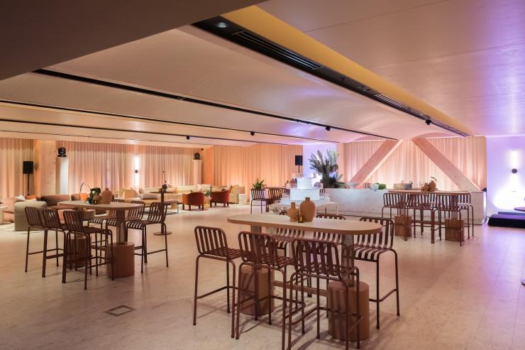 A view of The Box at Saltbox, a large pillarless event space with curved ceiling and tables and chairs. © Saltbox A view of The Box at Saltbox, a large pillarless event space with curved ceiling and tables and chairs. © Saltbox