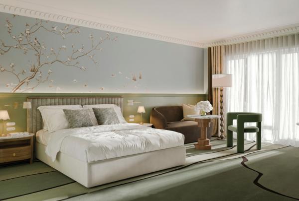 A render showing a lightfilled luxurious hotel room, with pastel carpets, wallpaper and plush furniture © Ardour Milton Park Bowral
