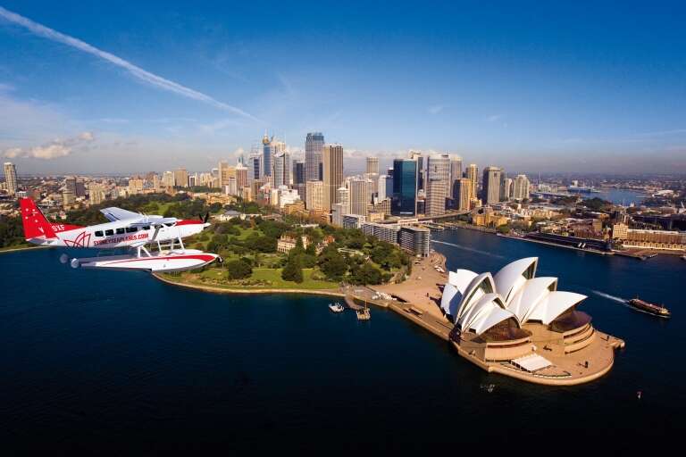 Aerial view of Sydney Opera House with seaplane, Sydney, New South Wales © Pretty Beach House