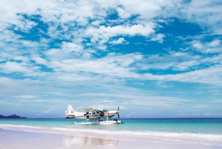 A seaplane sits in the shallows off Whitehaven Beach, Queensland © One&Only Hayman Island