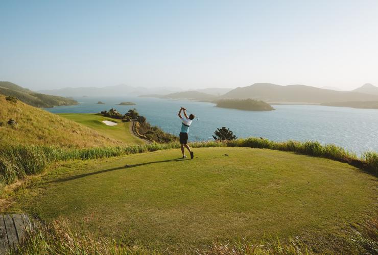 People playing golf on the Hamilton Island Golf Course on Dent Island with the Whitsunday Islands in the background © Tourism Australia People playing golf on the Hamilton Island Golf Course on Dent Island with the Whitsunday Islands in the background © Tourism Australia