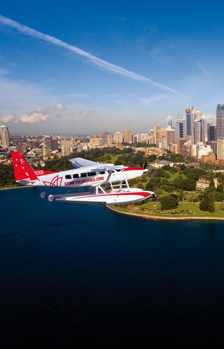 Aerial view of Sydney Opera House with seaplane, Sydney, New South Wales © Pretty Beach House Aerial view of Sydney Opera House with seaplane, Sydney, New South Wales © Pretty Beach House