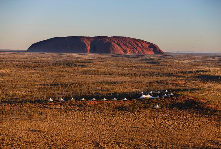 An aerial view of Longitude 131, Uluru-Kata Tjuta National Park, Red Centre, NT with Uluru in the background ©Luxury Lodges of Australia