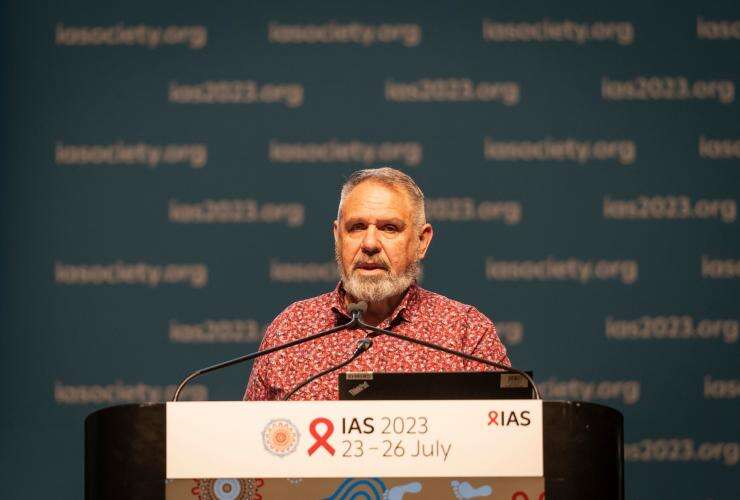 James Ward speaking at the Plenary session: Communities leading the way – Combining approaches to community engagement., IAS 2023, the 12th IAS Conference on HIV Science, Brisbane, Australia © Conor Ashleigh/ IAS