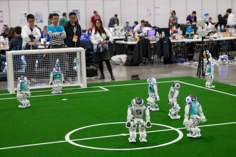 Robots playing on the field, RoboCup 2019, Sydney, New South Wales © RoboCup 2019
