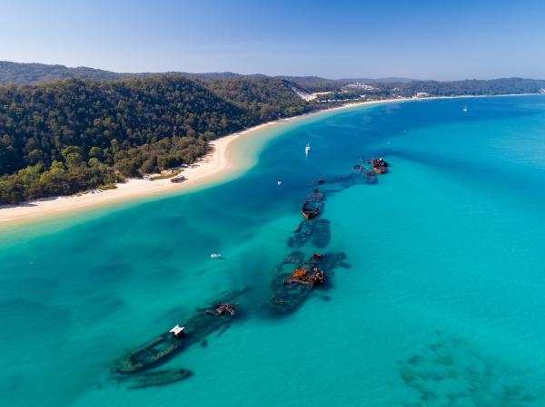 Aerial view of Tangalooma Wrecks, Moreton Island, Queensland © Tourism Australia