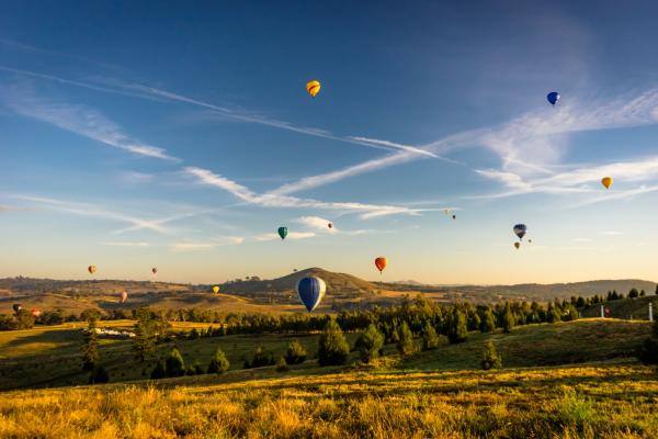 Hot air balloons over the National Arboretum Canberra, Australian Capital Territory © VisitCanberra