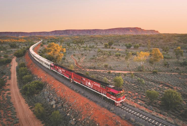 The Ghan heading through the MacDonnell Ranges, Northern Territory © Journey Beyond