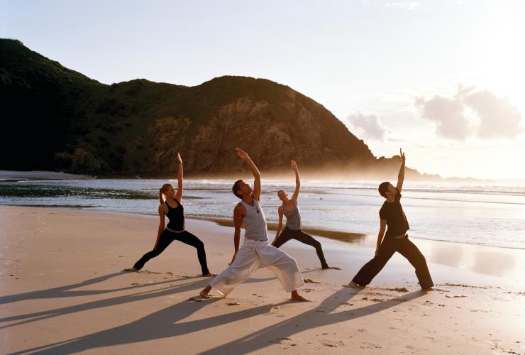 Sunrise yoga, Byron Bay, New South Wales © Tourism Australia