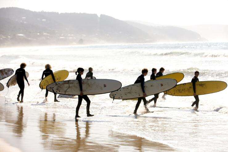 Surf lessons at Lorne, Great Ocean Road, Victoria © Tourism Australia