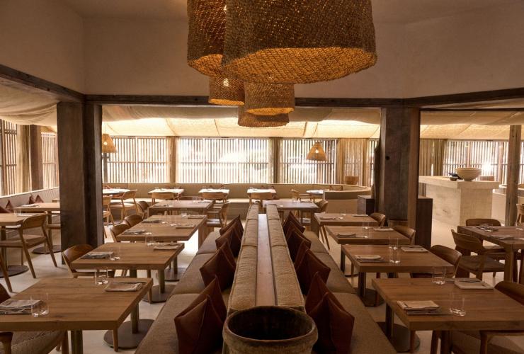 The restaurant floor showing tables and chairs at The Belongil Bistro, Byron Bay, New South Wales © The Belongil