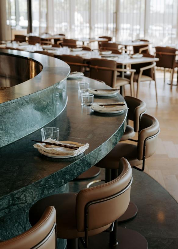 The curve of the green marble counter and view of tables at Yakisan, Adelaide, South Australia © Yakisan