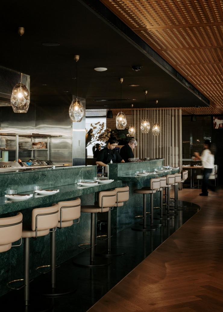 The green marble counter at Yakisan with team members working behind, Adelaide, South Australia © Yakisan
