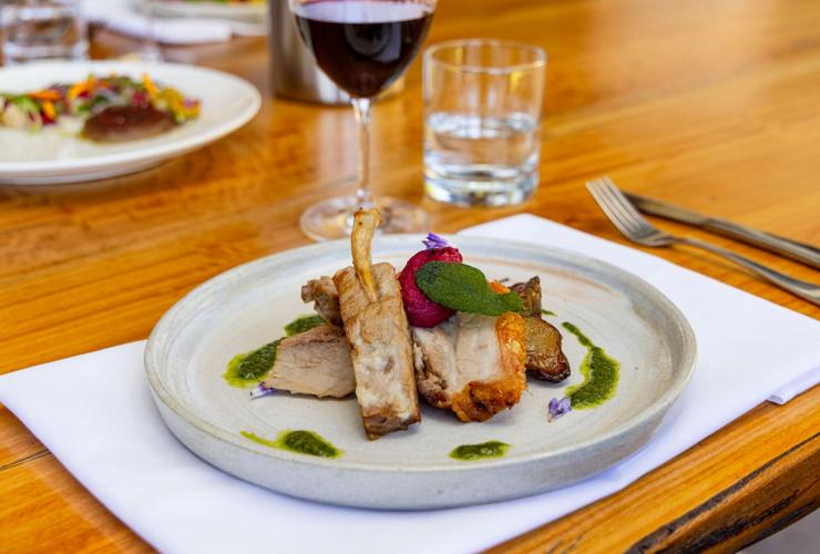 A plated meal on a dining table at Millbrook Restaurant, Perth Hills, Western Australia © Millbrook Restaurant