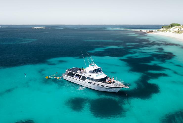 Moored in a quiet bay off Rottnest Island where guests enjoy a swim, Western Australia © CJ Maddock