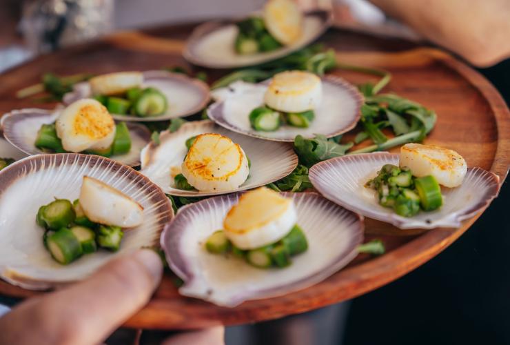 Local scallops served with asparagus in the shell, Western Australia © CJ Maddock