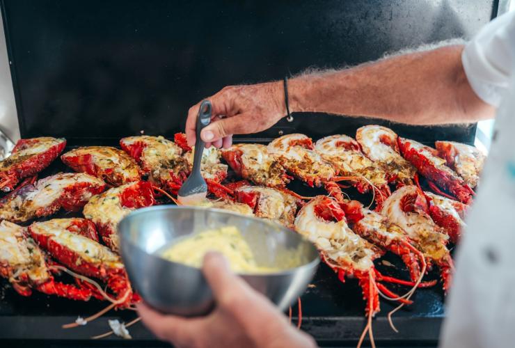 WA lobster being barbecued  onboard, Western Australia © CJ Maddock