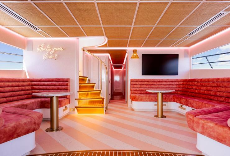 The lounge area with plush lounge seating on YOT VICE, Queensland © YOT Club