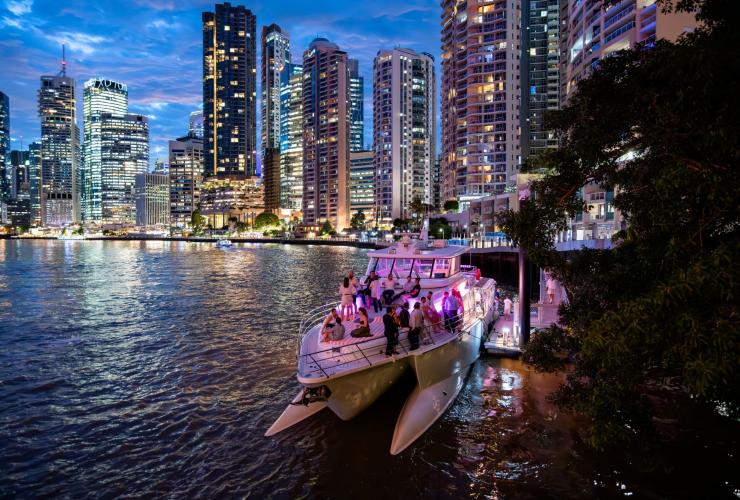 A night view of an event on YOT VICE with the city backdrop, Queensland © YOT Club