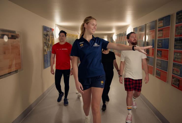 An Australian athlete takes a group on a guided tour of the complex and the Australian Institute of Sport (AIS), Canberra, Australian Capital Territory © AIS and CAoA