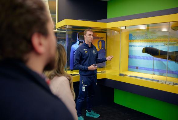 An athlete for AIS speaks to a group about the swimming program, Canberra, Australian Capital Territory © AIS and CAoA