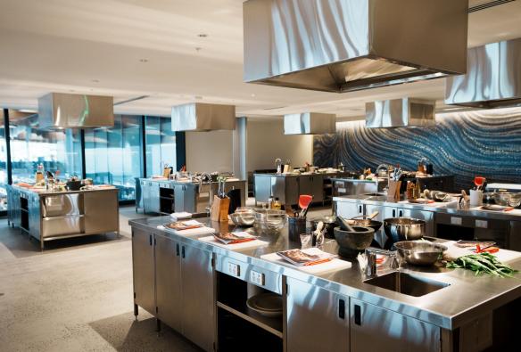 The kitchen showing expansive stainless steel benches for cooking classes, Sydney, New South Wales © Sydney Fish Market