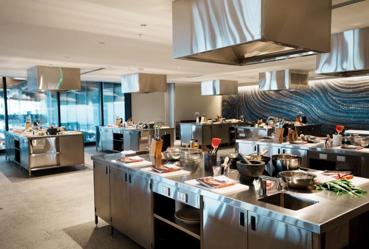 The kitchen showing expansive stainless steel benches for cooking classes, Sydney, New South Wales © Sydney Fish Market