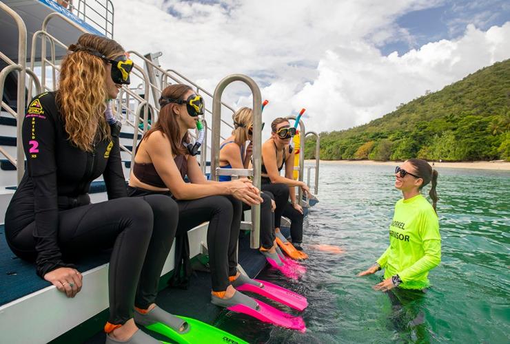 Group learning to snorkel with an instructor, Aquarius II, Cairns, Queensland © Aquarius II