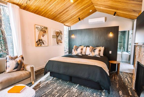 The bedroom of a luxe cabin at Cradle Mountain, Tasmania © Discovery Resorts – Cradle Mountain