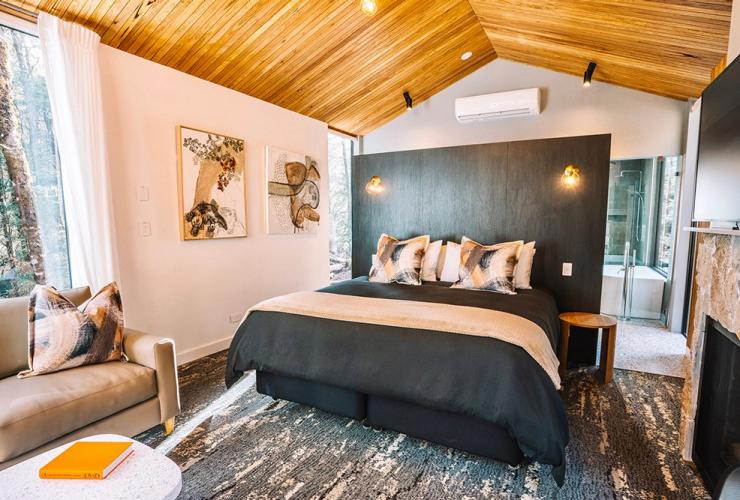 The bedroom of a luxe cabin at Cradle Mountain, Tasmania © Discovery Resorts – Cradle Mountain