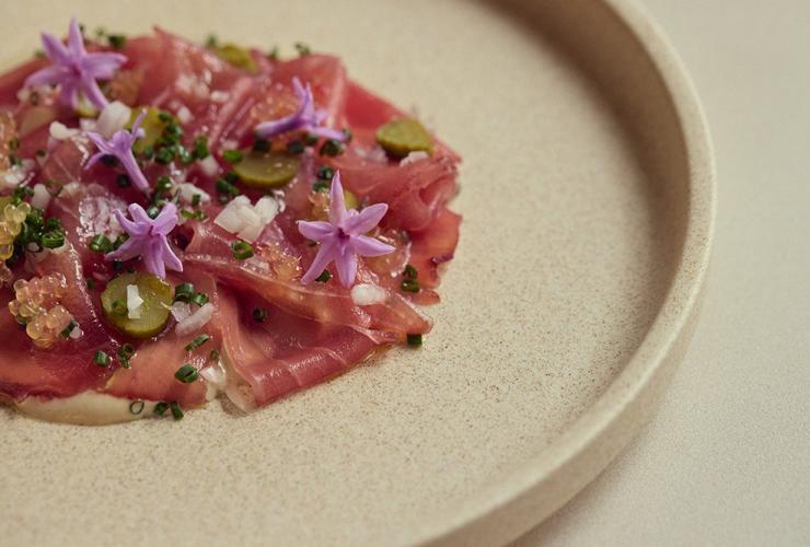 A dish of dry aged Yellow Fin Mooloolaba Tuna at Haven, Mondrian, Gold Coast, Queensland © Content Lion