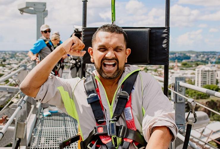 Jubilant at the top of the Story Bridge in the custom stair climber wheel chair, Brisbane, Queensland © Story Bridge Adventure Climb