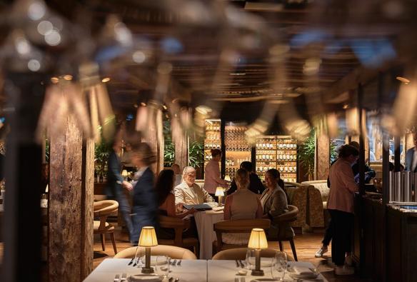 Guests seated at a table in The Dining Room at The Collective, Sydney, New South Wales © Steven Woodburn