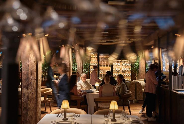 Guests seated at a table in The Dining Room at The Collective, Sydney, New South Wales © Steven Woodburn
