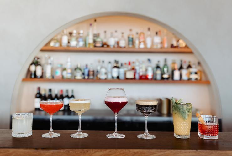 The arched bar with a colourful array of cocktails at Peats Bite © Peats Bite