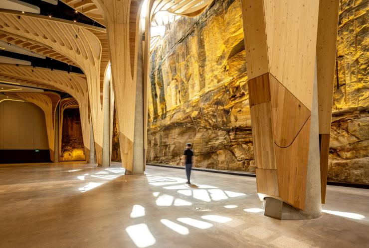 Light shines on the sandstone wall and cultural timber trees that adorn the Cutaway © ICC Sydney