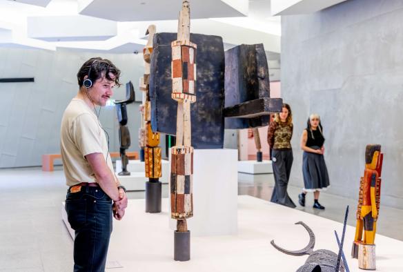 Group members explore First Nations sculpture at NGV Australia © National Gallery of Victoria